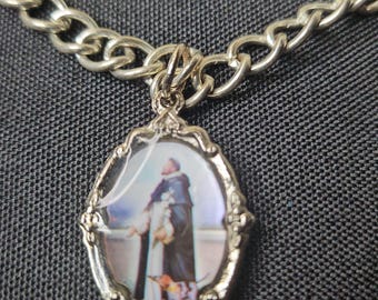 Armband met heiligenbedels