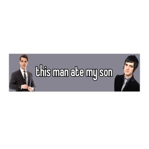 May include: A rectangular banner with a gray background and the text "this man ate my son" in white. The banner features two men in suits, one on each side.