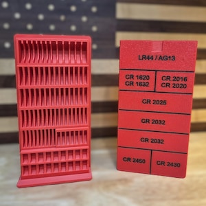 May include: A set of three ceramic mugs with a speckled, matte finish. The mugs are in shades of cream, light gray, and dark gray. Each mug has a simple, minimalist design, perfect for coffee or tea.