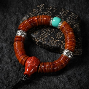Pulsera tibetana artesanal AURA DEER de 108 cuentas de disco de hueso de yak