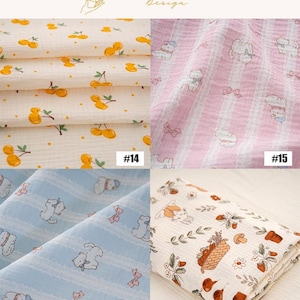 May include: A selection of four patterned fabrics. One features yellow cherries on a cream background. Another has white bears and pink bows on a pink striped background. The third has white bears and pink bows on a blue striped background. The last has a floral and basket design.