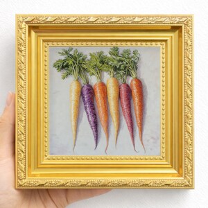 May include: A framed painting of six colorful carrots with green tops. The carrots are in shades of yellow, purple, orange, and red. The painting is in a gold frame.