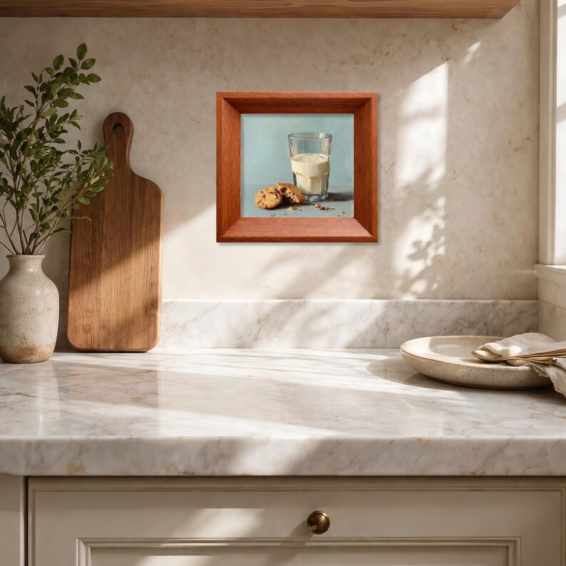 Hand painted oil artwork of a glass of milk and chocolate chip cookies, displayed in a warm wooden frame on a sunlit kitchen countertop, ideal for farmhouse kitchen decor, tabletop display, or gifting mom, wife, friend, foodie, or coffee lover, highlighting realistic cookie textures, handcrafted brushstrokes, and cozy breakfast inspired still life composition.
