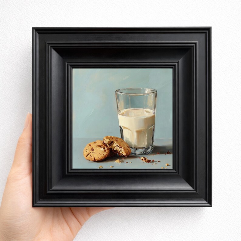 Small hand painted oil painting of a glass of milk and chocolate chip cookies, displayed in a sleek black frame and held in hand, perfect for kitchen tabletop decor, home wall art, or gifting mom, wife, friend, foodie, or coffee lover, highlighting realistic cookie textures, textured brushstrokes, and cozy breakfast inspired still life composition.