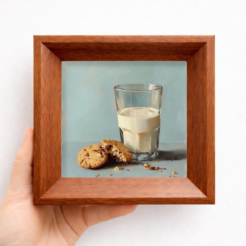Hand painted miniature oil artwork of a glass of milk with chocolate chip cookies, displayed in a warm wooden frame and held in hand, perfect for kitchen tabletop decor, breakfast inspired interiors, or gifting mom, wife, friend, foodie, or coffee lover, highlighting realistic cookie textures, handcrafted brushstrokes, and cozy breakfast inspired composition.