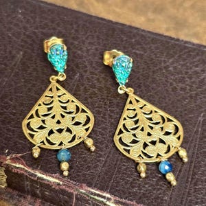 Handcrafted Art Nouveau-inspired earrings made from post-war vintage German glass rhinestones.