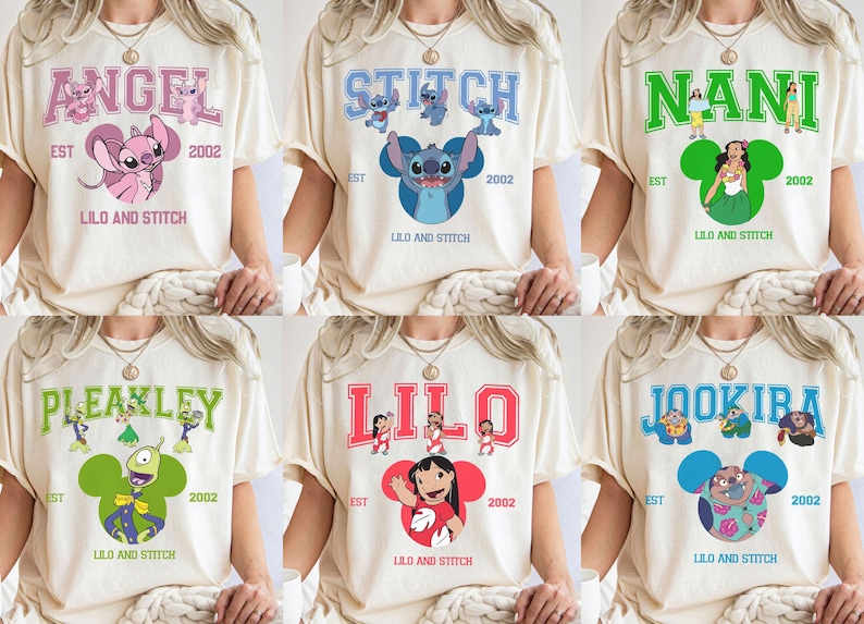 May include: Cream-colored t-shirts featuring various characters from "Lilo & Stitch." Each shirt displays a different character's name in a collegiate font, along with the text "EST 2002" and "LILO AND STITCH."