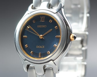 Vintage 1993 near mint seiko dolce 5e31-6e90  blue dial roman quartz men's watch