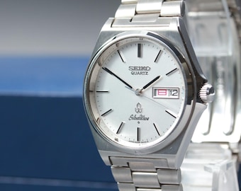 Vintage 1989 near mint / box seiko silver wave 8229-8000 day date kanji qz men's