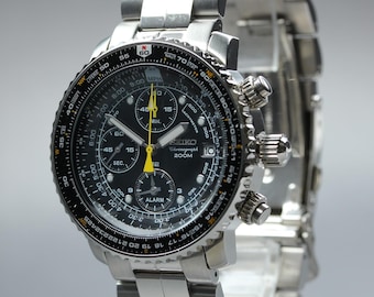 Near mint seiko flightmaster 7t62-0eb0 sna411p1 chronograph black quartz men's