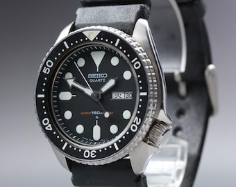 Vintage 1981 near mint seiko 7548-7000 diver's black 150m kanji 42mm quartz mens