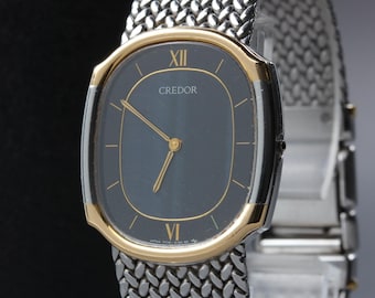 Read vintage 1993 exc+5 / case seiko credor 7770-5140 blue roman two tone men's