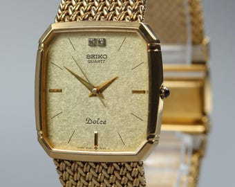 Vintage 1988 near mint seiko dolce 9521-5210 2p diamond gold qz mens watch japan