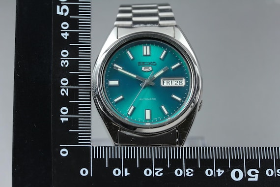 Near mint seiko 5 7s26-0480 green dial day date 38mm … - Gem