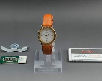 Vintage 1991 nos seiko alba success v701-6680 white gold 30mm quartz men's watch