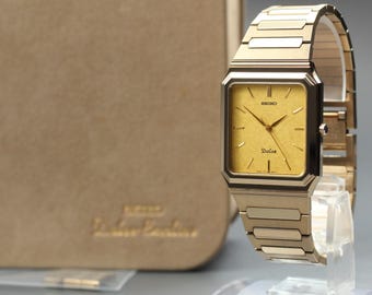 Vintage 1987 near mint / case seiko dolce 7741-5120 gold tank quartz men's watch