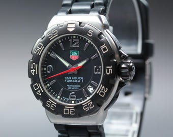 Nahezu neuwertige Tag Heuer Formula 1 WAC1210 Professional 200m Herrenuhr, schwarz, Quarz
