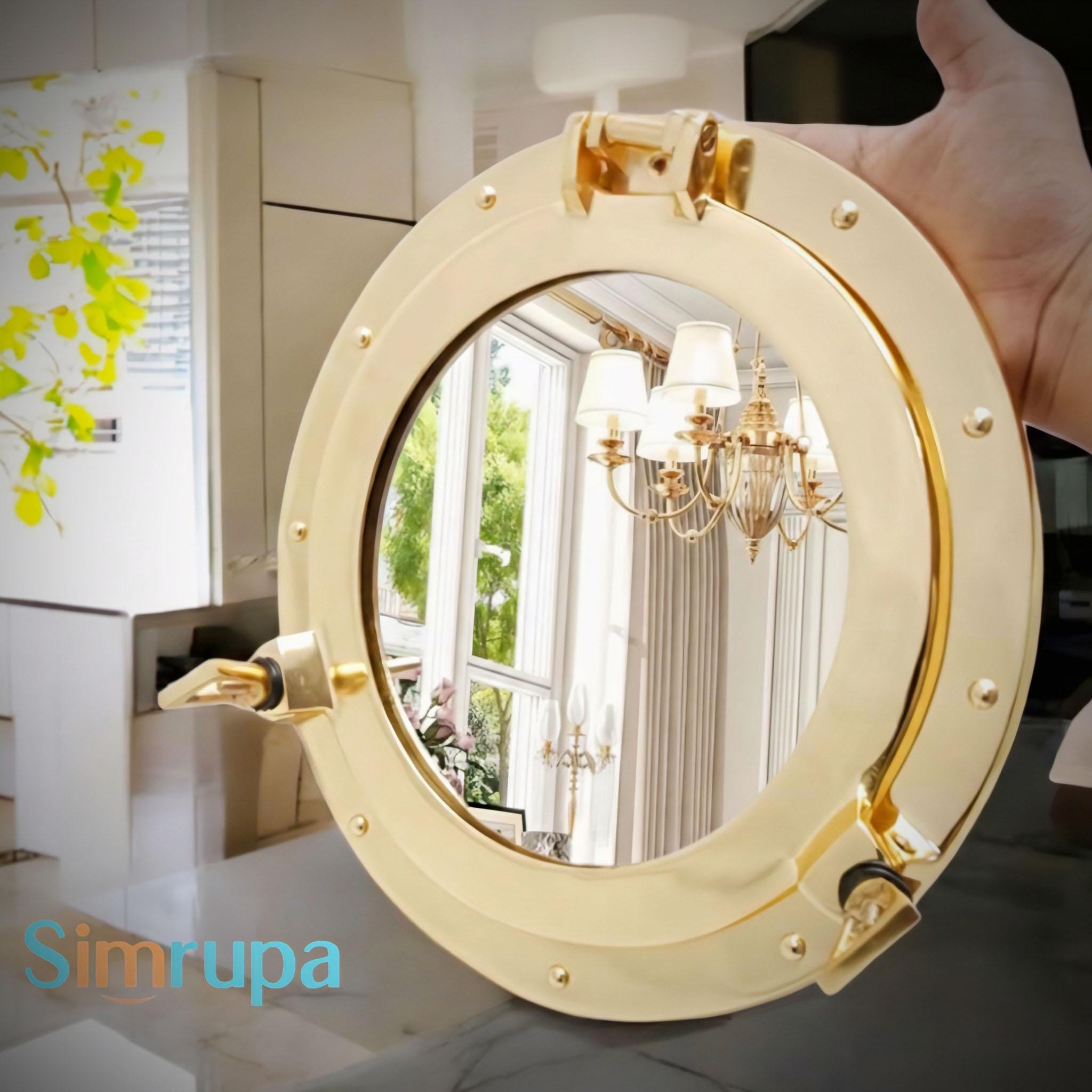 Chrome plated, mirrored portholes as maritime decoration for your walls