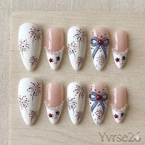 May include: A handmade wooden sign with the text "Welcome to our home" in a handwritten style. The sign is painted white with a dark stained wooden frame. A small green plant is placed on the sign.