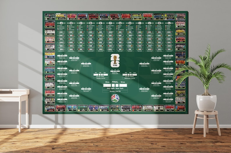 May include: A large green wall chart featuring team photos and a tournament bracket. The chart includes the FIFA logo and text indicating the final match location and date. A decorative plant in a white pot sits nearby.