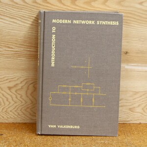 May include: A gray book with the title "Introduction to Modern Network Synthesis" by Van Valkenburg. The book cover features a simple circuit diagram.