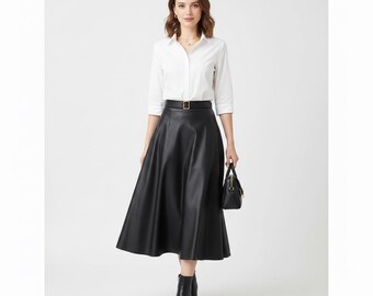 Falda midi de cuero negro de lujo para mujer, cintura alta, corte A, ideal como regalo de guardarropa.