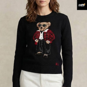 May include: A set of three ceramic mugs with a speckled, matte finish. The mugs are in shades of cream, light gray, and dark gray. Each mug has a simple, minimalist design, perfect for coffee or tea.