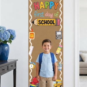 May include: A vertical tan banner featuring the text HAPPY first day of SCHOOL in colourful letters. The banner is decorated with illustrations of pencils, a glue bottle, a notebook, a ruler, a clock, an apple, books, and a yellow school bus.