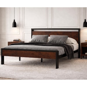 May include: A modern bed frame with a dark wood headboard and footboard, accented by a black metal frame. The bed is made up with striped pillows and a dark gray blanket. Two black pendant lights hang above the bed.