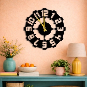 May include: A rustic wooden sign with the text "Welcome to our home" in white lettering. The sign features a distressed finish and a simple, inviting design, perfect for entryway decor.