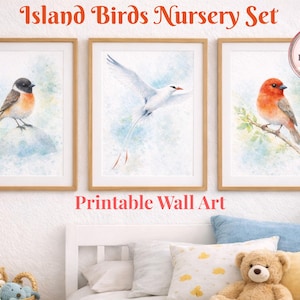 May include: Three framed watercolor prints featuring birds. The prints have a light blue and white watercolor background. The text "Island Birds Nursery Set" and "Printable Wall Art" are displayed above and below the prints. The prints are in a nursery setting.