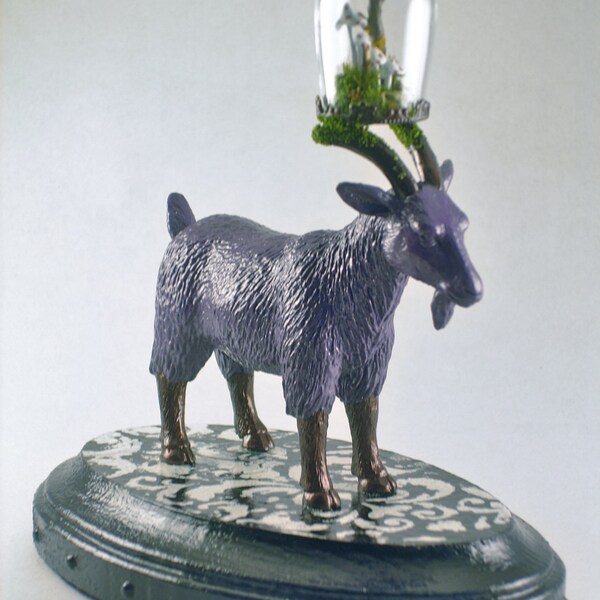 Mounted goat with miniature glass dome
