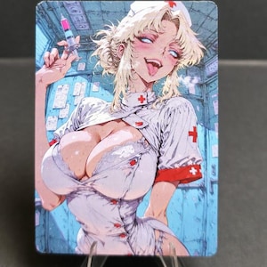 May include: A rectangular card featuring an anime-style illustration of a blonde nurse with a syringe. The nurse is wearing a white uniform with red crosses and a matching cap. The background is a blue-toned room.