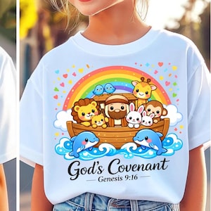 May include: White t-shirt featuring a colorful illustration of Noah's Ark with animals, a rainbow, and the text "God's Covenant - Genesis 9:16". The design includes a boat with animals, dolphins, and birds.