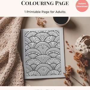 May include: A printable coloring page for adults featuring a black and white concentric circles design. The page is displayed open on a neutral surface, with text that reads "Concentric Circles Colouring Page" and "1 Printable Page for Adults."