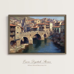 Puede incluir: Una impresión enmarcada de un paisaje urbano europeo con un puente de piedra sobre un río. Los edificios con tejados de tejas rojas bordean las orillas. La obra de arte tiene una estética vintage, con el texto "Enore Digitale Stories" y "Where Mood Becomes Art" en la parte inferior.