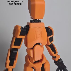 Macro detail of the reinforced ASA internal frame and shoulder joint. Engineered for high-tension durability and permanent poseability.