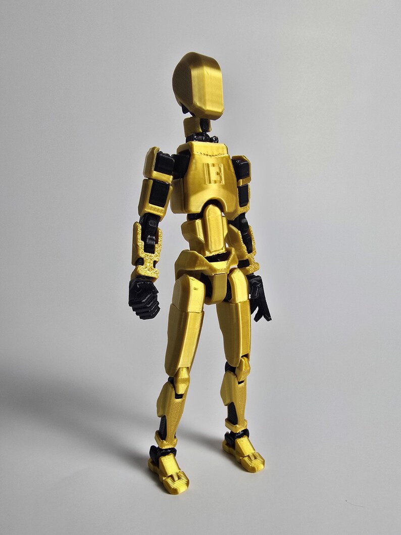 Side profile of the 8-inch Gold Artist model. Notice the seamless armor fit and anatomical precision across the torso and limbs.