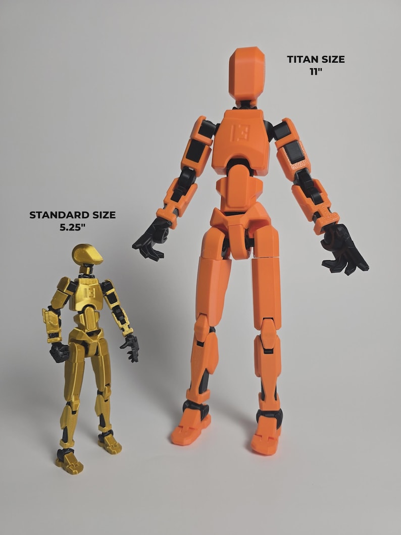 Comparison of the 5.25" Silk Gold Standard figure next to the 11" Orange Titan figure showing the size relationship between the two figures.