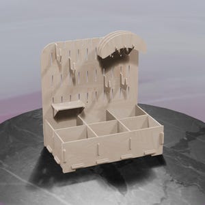 May include: A light-colored wooden organizer with multiple compartments, hooks, and a shelf. The organizer has a pegboard-style back with various slots and hooks for hanging items. The base features several square compartments.