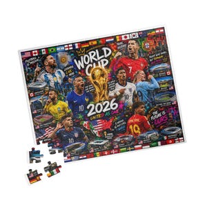 May include: A rectangular jigsaw puzzle featuring a vibrant collage of soccer players, the FIFA World Cup trophy, and stadium imagery. The text reads World Cup 2026 United As One, with various national flags bordering the top and bottom edges.