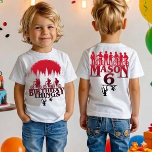 May include: A set of three ceramic mugs with a speckled, matte finish. The mugs are in shades of cream, light gray, and dark gray. Each mug has a simple, minimalist design and a rounded handle.