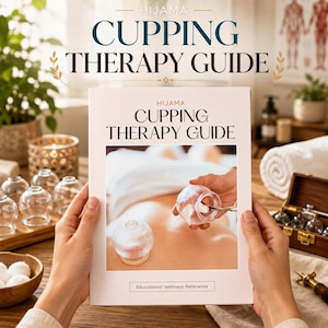 May include: A white softcover book titled Hijama Cupping Therapy Guide with a central photograph showing clear glass cupping cups placed on a back. The cover includes the text Hijama Cupping Therapy Guide and Educational Wellness Reference.