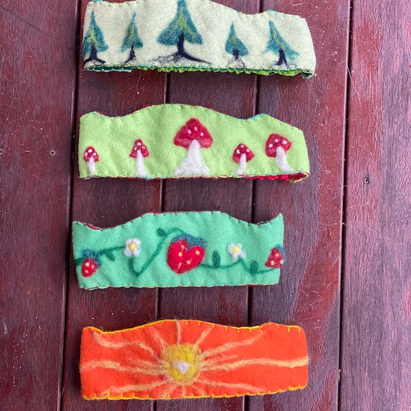 Simple Waldorf Birthday Crowns, featuring a sun, mushrooms, strawberries, and pine trees