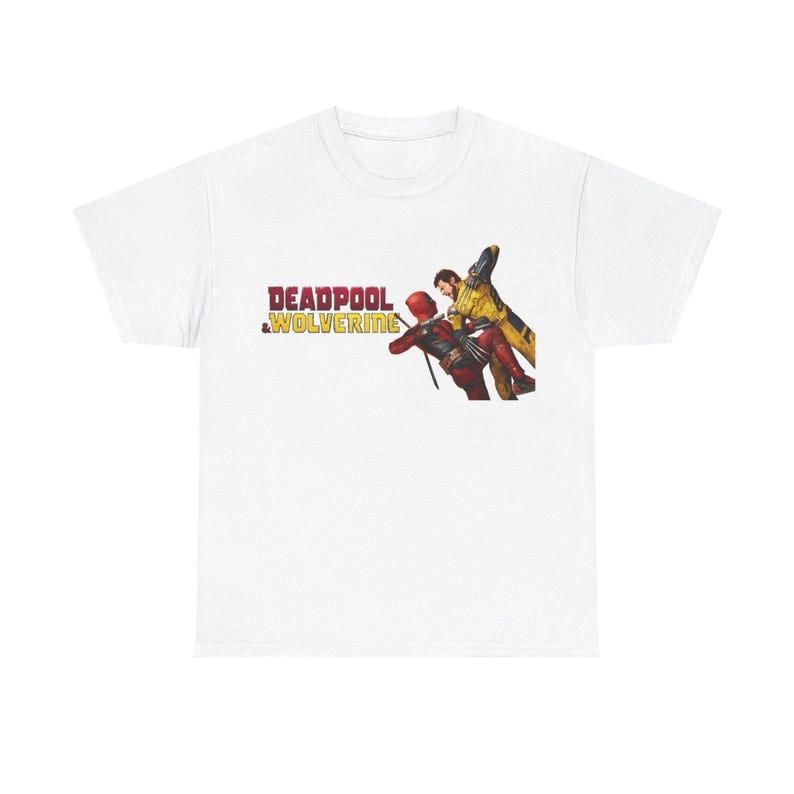 A white t-shirt with a graphic design featuring two characters from the Marvel Cinematic Universe, specifically Deadpool and the Wolverine team.