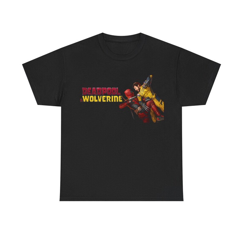 A black t-shirt with a graphic design featuring a character from the Marvel Cinematic Universe, specifically the character Deadpool, and the text "Deadpool & Wolverine".