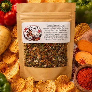 May include: A brown paper pouch containing a dry food mix labelled The All Dressed Chip. The label features a hermit crab logo and lists ingredients including black soldier fly larva, shrimp, beef liver, bell pepper, squash, and various seeds.