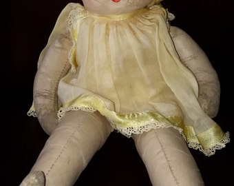 Antique Soft leather stitched doll yellow dress blonde tight curly hair circa 1950's