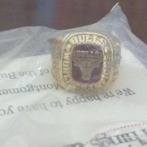 Official 1991 Replica Ring for The  Chicago Bulls Championship Season in unopened original plastic bag from Montgomery Ward Department Store