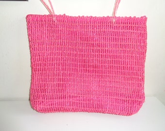 Vintage Hot Pink Woven Straw Summer Handbag in Mint Condition and never used with wonderful woven texture in a Timeless Classic Style